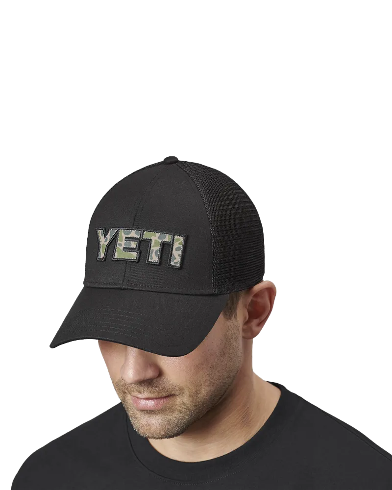 Camo Logo Badge Trucker Cap in Black